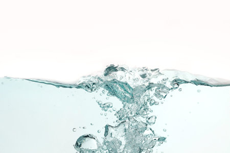 Close up water splash with air bubbles. Fresh and clean surface aqua flowing in wave and clean water...