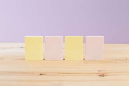 color blank sticky notes on wooden deskの写真素材