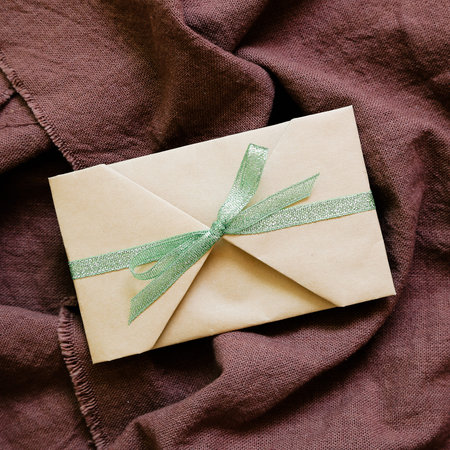 Handmade card on brown cloth background