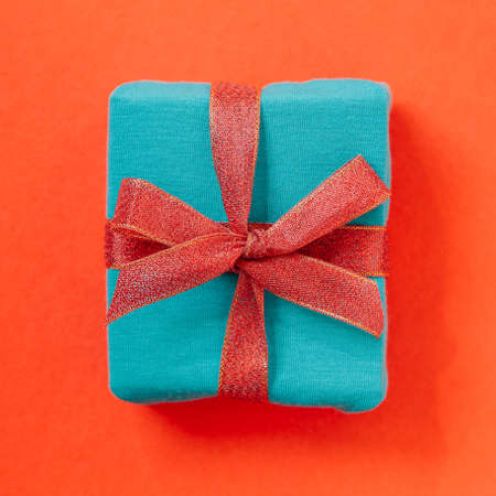 Gift on simple color paper backgroundの写真素材