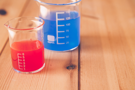 Glass measuring beaker in Laboratory, Science experiment conceptの写真素材