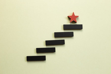 Stairs block on khaki background. Growth and challenge concept