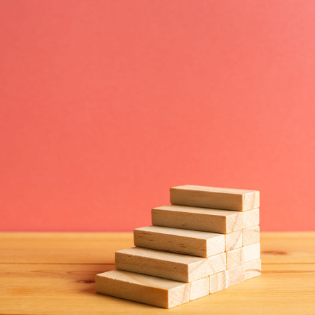 Wood block stairs with pink background. Business development, growth, success concept. with copy...