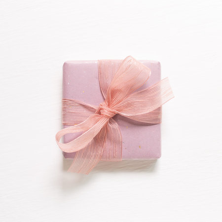 Light purple gift box isolated on white background. top view