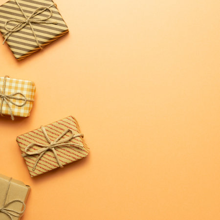 Gift boxes on orange background. flat lay, top view, copy space