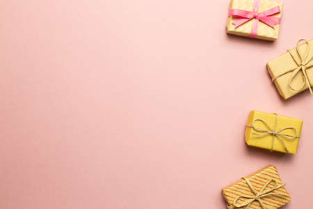 Gift boxes on pink background. flat lay, top view, copy spaceの写真素材