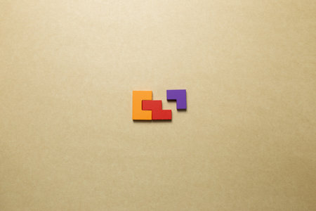 Color blocks on brown background. Creative thinking, idea, problem solving, success concept. top viewの写真素材