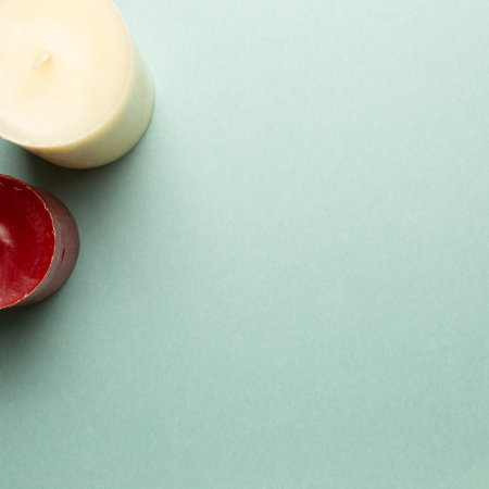 Aromatic color candles on green background. top view, copy spaceの写真素材