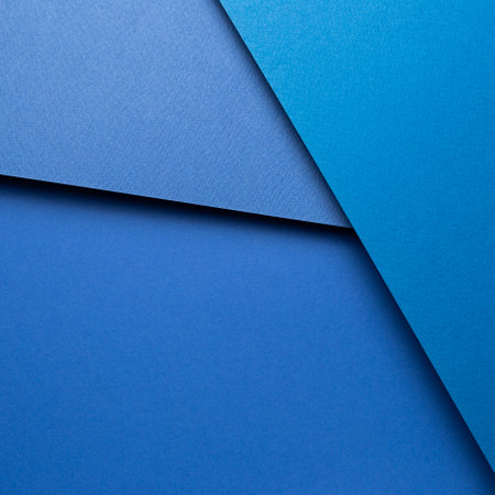 Abstract blue layered color paper backgroundの写真素材