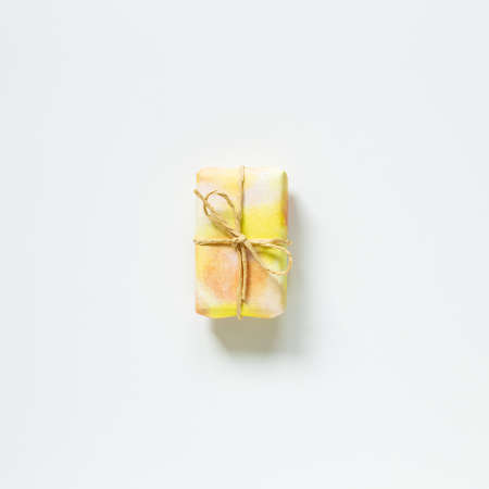 Yellow gift box isolated on white background. top view, copy spaceの写真素材