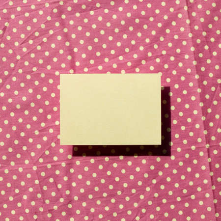 Blank memo pad, empty paper on fabric background. top view, copy spaceの写真素材