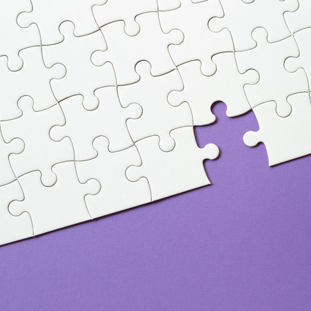 Set of white puzzle pieces and last one piece