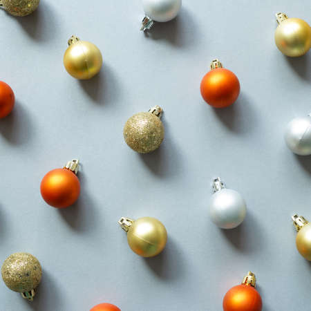 Christmas ornaments. Colorful baubles on gray background. flat lay, top viewの写真素材