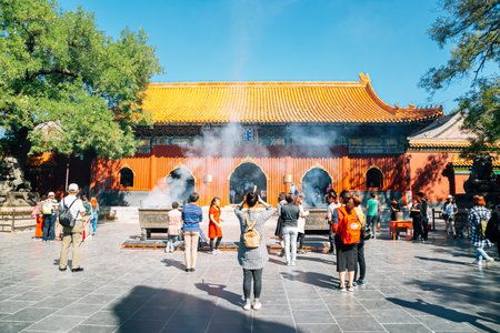 Beijing, China - September 21, 2018 : Lama Temple and praying peopleのeditorial素材
