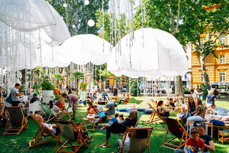 Zagreb, Croatia - July 3, 2019 : People resting at Zrinjevac park