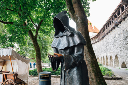 Tallinn, Estonia - August 14, 2019 : Monk statue at Danish King's Garden
