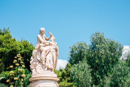 Athens, Greece - August 6, 2019: Statue of Lord Byron with green treesのeditorial素材