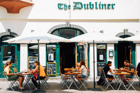 Heidelberg, Germany - June 5, 2019: Old town Hauptstrasse main street restaurant pubのeditorial素材