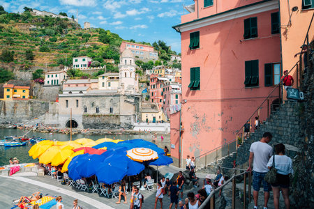 Cinque Terre, Italy - August 16, 2016: Seaside village Vernazza, Summer beach and tourist people