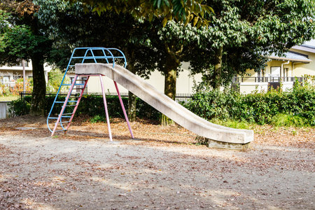 Playground slide with autumn leaves in Japanのeditorial素材