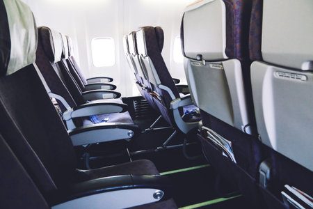 Empty airplane seats in the economy class cabin