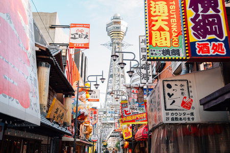 Osaka, Japan - October 1, 2018 : Tsutenkaku tower and Shinsekai food restaurant streetのeditorial素材