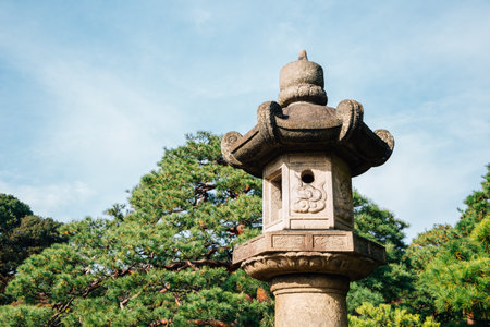 Japanese traditional stone lantern at Rikugien Gardens in Tokyo, Japanのeditorial素材
