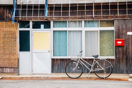 Old wooden house and bicycle in Shodoshima, Shikoku, Japanのeditorial素材