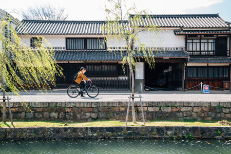 Okayama, Japan - April 15, 2019 : Kurashiki Bikan Historical Quarter, canal and traditional houseのeditorial素材