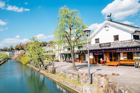 Okayama, Japan - April 15, 2019: Kurashiki Bikan Historical Quarter, canal and traditional villageのeditorial素材