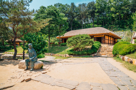 Chuncheon, Korea - June 03, 2016 : Thatched-roof house at literary village of Kim you jeongのeditorial素材