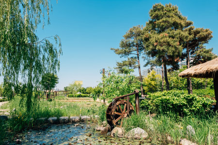 Water mill and pond in Bucheon Sangdong Lake Park, Korea