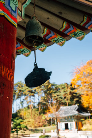 Wind chime hanging under the eaves at Silleuksa Temple in Yeoju, Korea