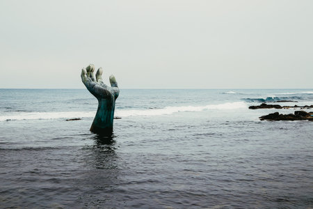 Pohang, Korea - February 8, 2017 : Sea and hand sculpture in Homigotのeditorial素材