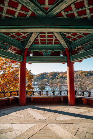 Korean traditional pavilion and autumn nature scenery at Andong Folk Village in Andong, Koreaのeditorial素材