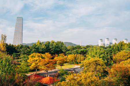 View of Hanbat Arboretum and modern buildings at autumn in Daejeon, Koreaのeditorial素材