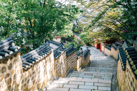 Stone wall street and green trees at Beomeosa temple in Busan, Korea