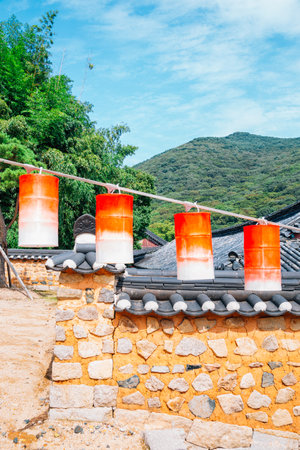 Colorful lanterns and Korean traditional stone wall at Beomeosa temple in Busan, Koreaのeditorial素材