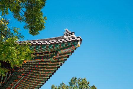Jogyesa Temple Korean traditional roof eaves with green trees in Seoul, Korea