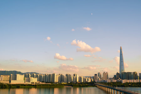 Panoramic view of Hangang River and Seoul city skyline with sunset sky in Koreaのeditorial素材