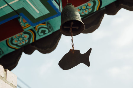Wind chime hanging under the eaves of korean temple in Incheon, Koreaのeditorial素材