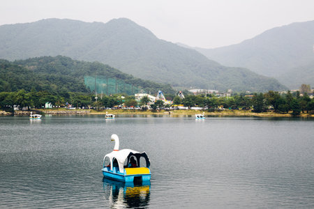Duck boat on lake with mountain at Uirimji Reservoir in Jecheon, Koreaのeditorial素材