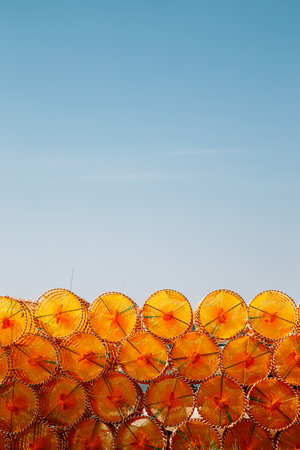 Stacked orange fishing trap net at BaeksaJang port in Anmyeondo Island, Taean, Koreaのeditorial素材