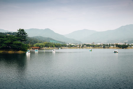 Duck boat on lake with mountain at Uirimji Reservoir in Jecheon, Koreaのeditorial素材