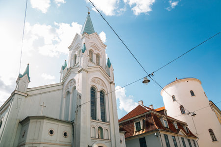Our Lady of Sorrows Church and old town street in Riga, Latviaのeditorial素材