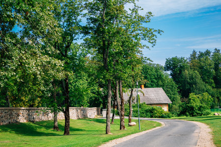 Countryside village road at summer in Sigulda, Latviaのeditorial素材