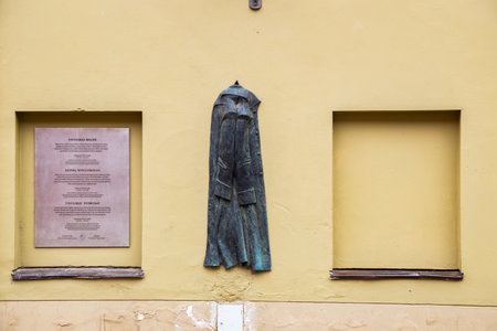 Vilnius, Lithuania - August 10, 2019: Uzupis old town Vivulskis overcoat sculptureのeditorial素材
