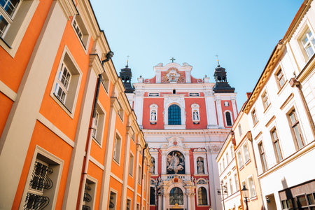 Saint Stanislaus Church (Fara Church) and old town street in Poznan, Polandのeditorial素材