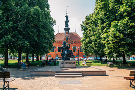 Gdansk, Poland - June 12, 2019: Monument of Astronomer Johannes Hevelius and Old Town Hallのeditorial素材