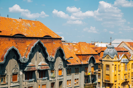 Victory square old buildings at summer in Timisoara, Romaniaのeditorial素材